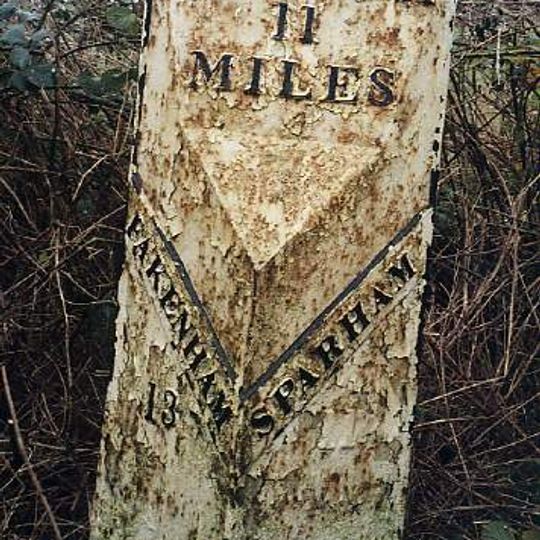 Milepost, 140yds E of turning to Wildlife Park