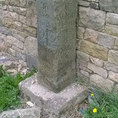 Milestone, Redgate, N end of stone cottage wall