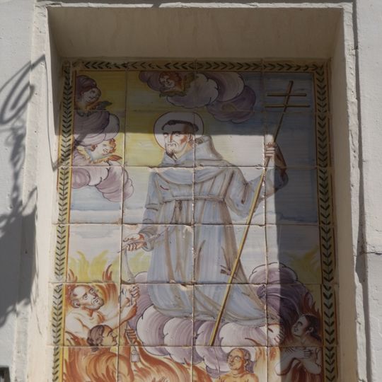 Retablo cerámico de San Francisco de Asís en calle l'Ereta