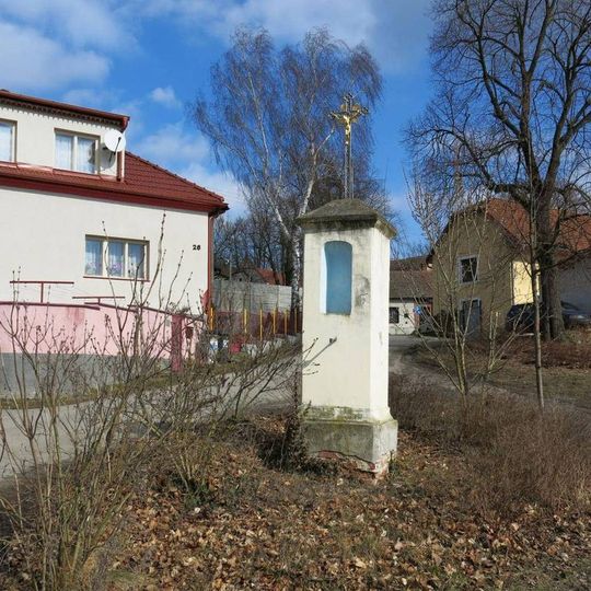 Kříž na návsi v Mělnické Vrutici