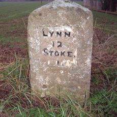 Milestone, Lynn Road, by 'The Four Winds',