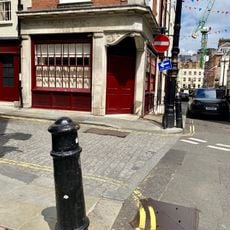 2 Bollards At North West And North East Corners Of Junction With Hertford Street