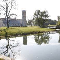 Nallin Farm Springhouse and Bank Barn