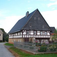 Wohnstallhaus (Umgebindehaus) eines ehemaligen Vierseithofes Reinholdshainer Straße 2