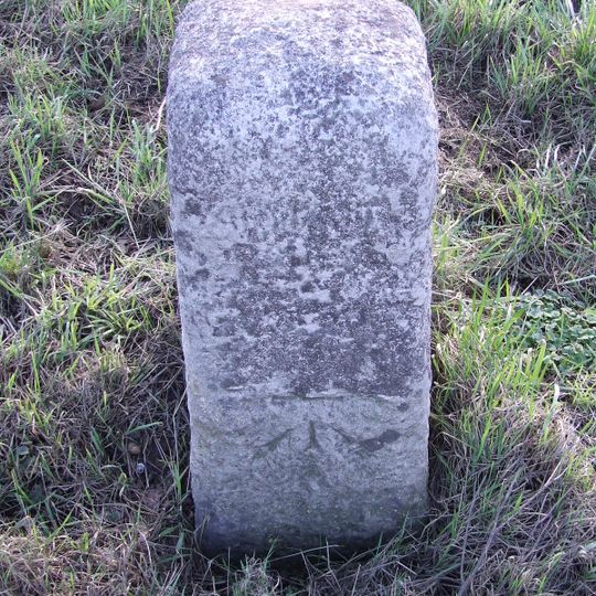 Milestone, by 40mph sign