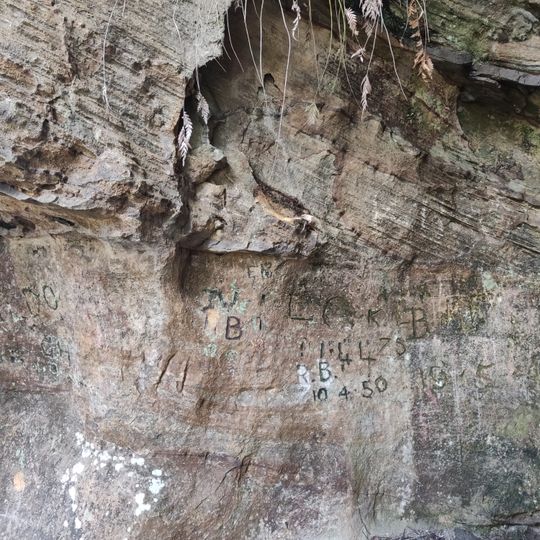 Historic graffiti from 1940-50s inscribed in the rock