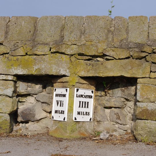 Milestone, Main Road, opp. UR church