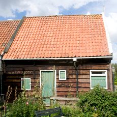 Perceelsgedeelte van een houten huis