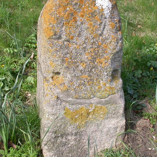 Milestone, centre of village, by village hall