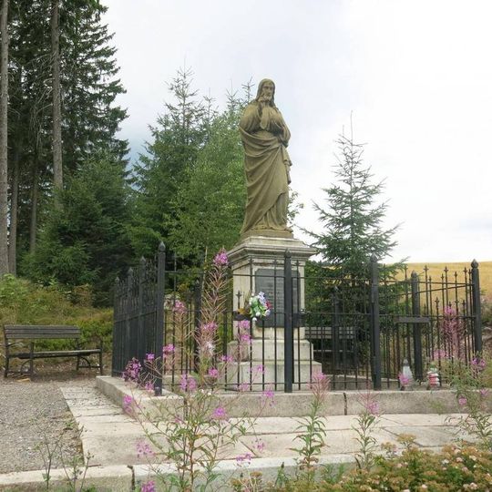 Socha Krista v lesoparku v Perninku