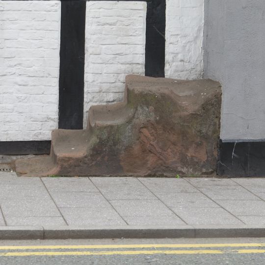 Mounting block at right hand of numbers 26-30