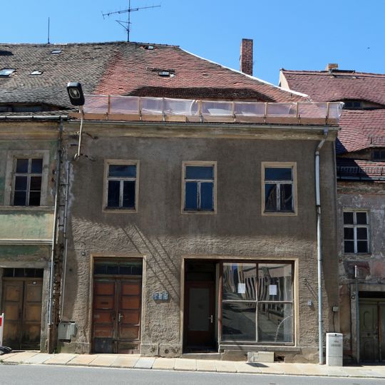 Wohnhaus mit späterem Laden in geschlossener Bebauung Pulsnitzer Straße 34