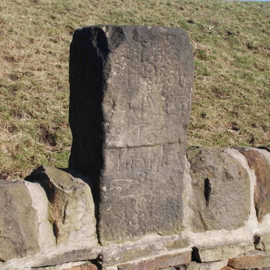 Guidestone Set In Wall Opposite Junction With Glen Lee Lane