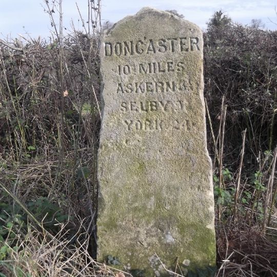Milestone, S of Balne Moor X rds at minor X rds
