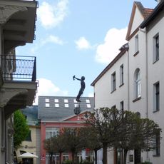 Mały rybak z siecią