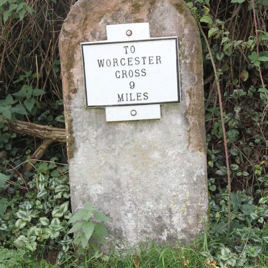Milestone, W of Ham Bridge, 60 yds from jct with B4204