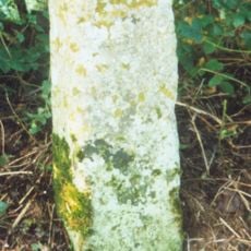 Milestone, W edge of Finmere Village, opp. boundary fence of school