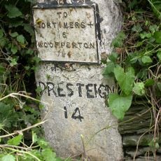 Milestone, Comberton; 30m E jcn Orleton turn