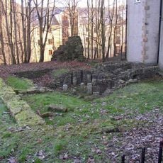 Part of a Roman fort and its associated vicus and remains of a pre-Conquest monastery and a Benedictine priory on Castle Hill