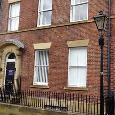 Gas Lamp Post On Pavement Between Numbers 3 And 4