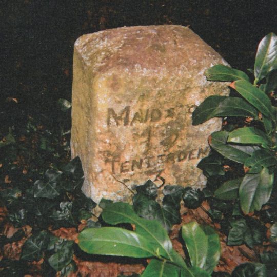 Milestone, Tenterden Road, S of "Castleton's Oak" PH, nr Brogues Wood