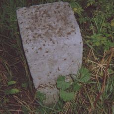Milestone, W of Ashford Friars Prep School