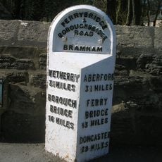 Milestone, S end of Bramham nearly opp war memorial