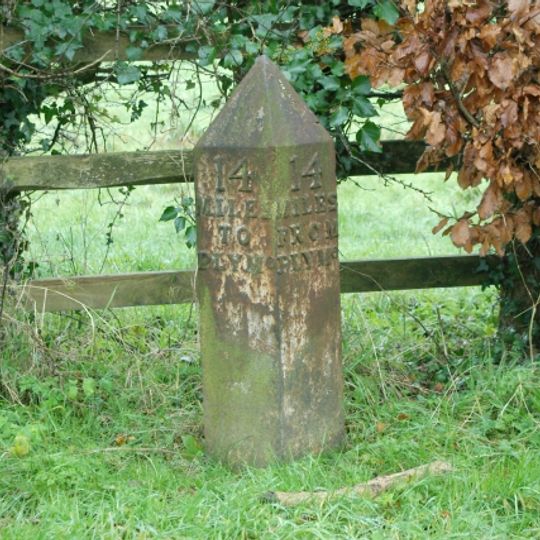 Milepost, Wrangaton Cross, jct with A3121 to A38 slip road, opp garage, nr Post Office