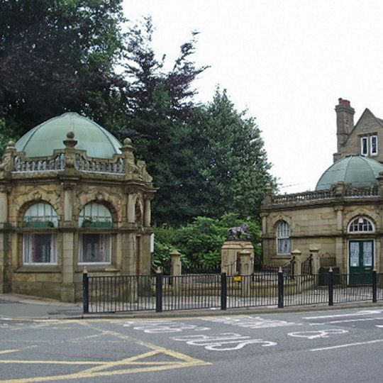Pair Of Former Tram Shelters And Attached Railings Enclosing Centre Of Square