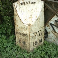 Milepost, by Bell Inn