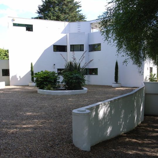 High And Over With Attached Walls, Steps And Pergola