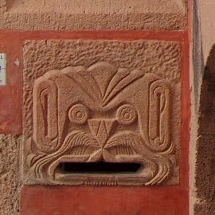 Monster head dressed as a mailbox