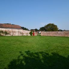 Wall on South Side of Priory Green from Tithe Barn and Across the Front of Nos 5 and 7 Priory Green