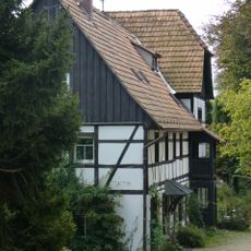 Wohnstallhaus (mit dorfseitigem Anbau) und Scheune eines Bauernhofes Pirnaer Straße 78