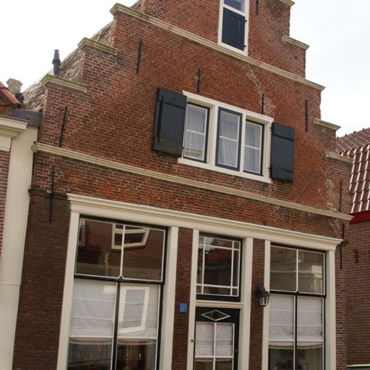 Pand met gave bakstenen trapgevel