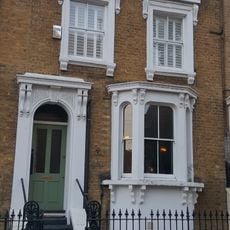 1-25 Tomlins Grove and area railings and gate piers