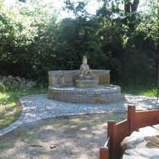 Socha Budhy v Zahradě soucitu v osadě Na Kopečku