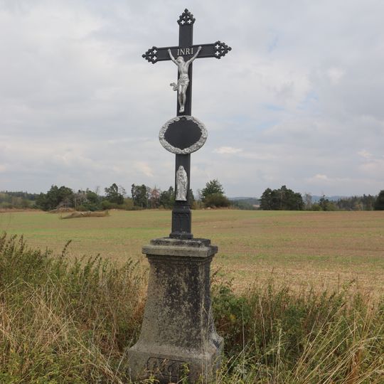 Kříž u silnice západně od Rohů