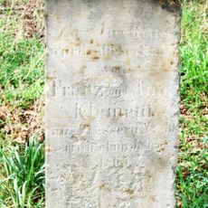 Kříž u silnice severně od Břežan