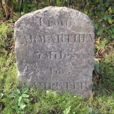 Milestone on B4301 in Bronwydd Arms village