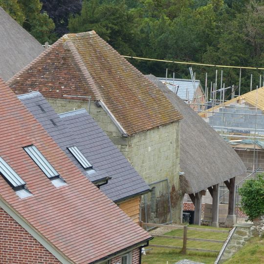 Dovecote and attached open shelter building 60m south-west Of Church Farmhouse